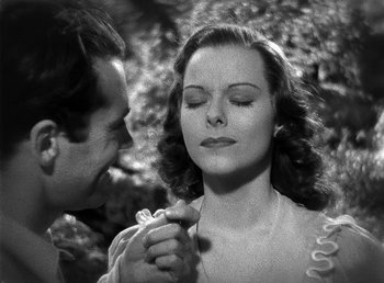 Movie still from “Spawn of the North” (1938), directed by Henry Hathaway – A man and a woman are looking at each other; Close Up shot, High angle