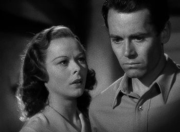 Movie still from “Spawn of the North” (1938), directed by Henry Hathaway – A man and a woman standing next to each other; Close Up shot, Low angle