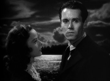 Movie still from “Spawn of the North” (1938), directed by Henry Hathaway – A black and white photo of a man and a woman; Close Up shot, Low angle
