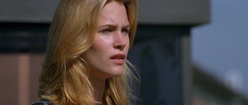 Movie still from “Species” (1995), directed by Roger Donaldson – A person with blonde hair; Close Up shot, Low angle