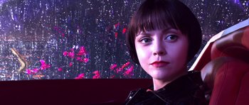 Movie still from “Speed Racer” (2008), directed by Lilly Wachowski – A person with short brown hair; Close Up shot, Low angle