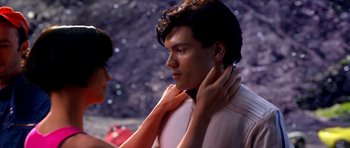 Movie still from “Speed Racer” (2008), directed by Lilly Wachowski – A man and a woman are touching their necks together; Close Up shot, High angle