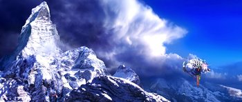 Movie still from “Speed Racer” (2008), directed by Lilly Wachowski – A mountain range with snow on it and a cloudy sky above it; Extreme Wide shot, Low angle