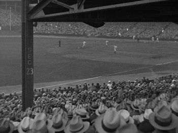 Movie still from “Speedy” (1928), directed by Ted Wilde – A crowd of people watching a baseball game in a stadium; Extreme Wide shot, High angle