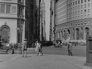 Movie still from “Speedy” (1928), directed by Ted Wilde – A black and white photo of people on a street; Extreme Wide shot, High angle
