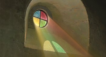 Movie still from “Spirited Away” (2001), directed by Hayao Miyazaki – A round window in a room that has a rainbow colored window; Extreme Wide shot, Low angle