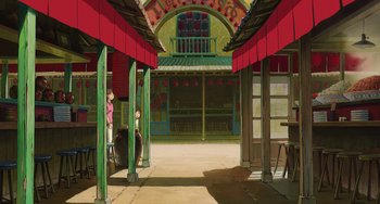 Movie still from “Spirited Away” (2001), directed by Hayao Miyazaki – An animated picture of an open air market place; Extreme Wide shot, Low angle