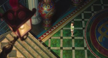 Movie still from “Spirited Away” (2001), directed by Hayao Miyazaki – A child standing on the stairs of a house; Extreme Wide shot, Overhead angle