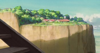 Movie still from “Spirited Away” (2001), directed by Hayao Miyazaki – A painting of a house on the side of a cliff; Extreme Wide shot, Low angle