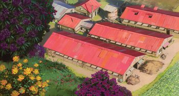 Movie still from “Spirited Away” (2001), directed by Hayao Miyazaki – An aerial view of some houses with red roofs; Extreme Wide shot, High angle