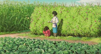 Movie still from “Spirited Away” (2001), directed by Hayao Miyazaki – A woman standing next to a bush with a child in it; Extreme Wide shot, Low angle
