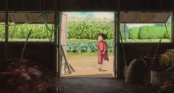 Movie still from “Spirited Away” (2001), directed by Hayao Miyazaki – A girl is standing in a barn looking out the door; Extreme Wide shot, High angle