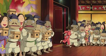 Movie still from “Spirited Away” (2001), directed by Hayao Miyazaki – A group of people standing next to each other in a room; Extreme Wide shot, High angle