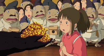 Movie still from “Spirited Away” (2001), directed by Hayao Miyazaki – A group of people standing around a pile of gold coins; Medium shot, High angle