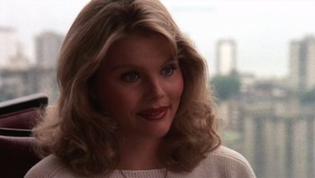 Movie still from “Star 80” (1983), directed by Bob Fosse – A person with long hair; Close Up shot, High angle