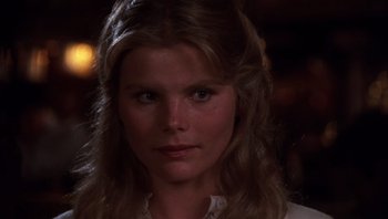 Movie still from “Star 80” (1983), directed by Bob Fosse – A person with long hair; Close Up shot, Over the shoulder angle