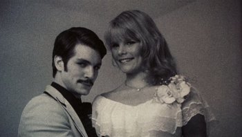 Movie still from “Star 80” (1983), directed by Bob Fosse – A man and a woman posing for a picture; Close Up shot, Low angle