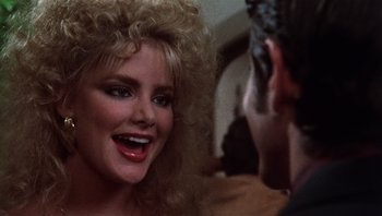 Movie still from “Star 80” (1983), directed by Bob Fosse – A person talking to another person; Close Up shot, Over the shoulder angle