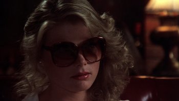 Movie still from “Star 80” (1983), directed by Bob Fosse – A person wearing sunglasses; Close Up shot, Low angle