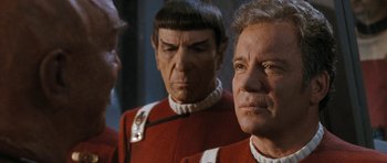 Movie still from “Star Trek VI: The Undiscovered Country” (1991), directed by Nicholas Meyer – A group of men standing next to each other; Close Up shot, Over the shoulder angle