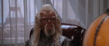 Movie still from “Star Trek VI: The Undiscovered Country” (1991), directed by Nicholas Meyer – A man with a long white hair and a beard; Close Up shot, Over the shoulder angle