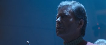 Movie still from “Star Trek VI: The Undiscovered Country” (1991), directed by Nicholas Meyer – An older man looking up into the sky; Close Up shot, Low angle