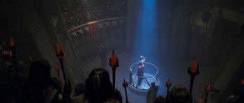 Movie still from “Star Trek VI: The Undiscovered Country” (1991), directed by Nicholas Meyer – An audience watching a man in a cage; Extreme Wide shot, High angle