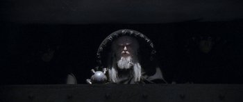 Movie still from “Star Trek VI: The Undiscovered Country” (1991), directed by Nicholas Meyer – An old man with long white hair and a white beard; Medium shot, Low angle