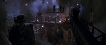 Movie still from “Star Trek VI: The Undiscovered Country” (1991), directed by Nicholas Meyer – A group of people standing on top of a wooden bridge; Extreme Wide shot, High angle