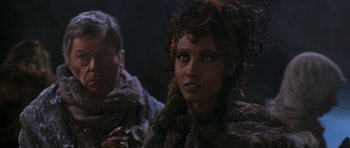 Movie still from “Star Trek VI: The Undiscovered Country” (1991), directed by Nicholas Meyer – A person wearing a fur coat; Close Up shot, Over the shoulder angle