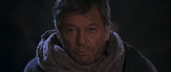 Movie still from “Star Trek VI: The Undiscovered Country” (1991), directed by Nicholas Meyer – A person wearing a scarf; Close Up shot, Over the shoulder angle