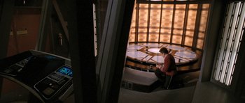 Movie still from “Star Trek VI: The Undiscovered Country” (1991), directed by Nicholas Meyer – A man sitting on a chair in front of a window; Extreme Wide shot, High angle