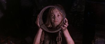 Movie still from “Star Trek VI: The Undiscovered Country” (1991), directed by Nicholas Meyer – A young girl holding onto a metal ring; Close Up shot, Low angle