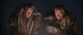 Movie still from “Star Trek VI: The Undiscovered Country” (1991), directed by Nicholas Meyer – A couple of men standing next to each other; Close Up shot, Low angle