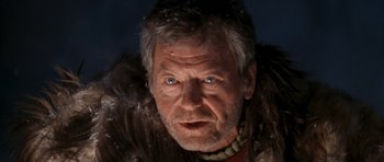 Movie still from “Star Trek VI: The Undiscovered Country” (1991), directed by Nicholas Meyer – An older man wearing a fur coat and a necklace; Close Up shot, Low angle