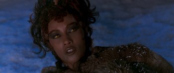 Movie still from “Star Trek VI: The Undiscovered Country” (1991), directed by Nicholas Meyer – A woman's face in a scene; Close Up shot, Over the shoulder angle