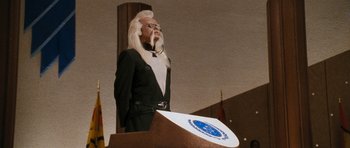 Movie still from “Star Trek VI: The Undiscovered Country” (1991), directed by Nicholas Meyer – A man with a long white beard standing at a podium; Medium shot, Low angle