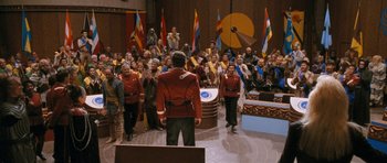 Movie still from “Star Trek VI: The Undiscovered Country” (1991), directed by Nicholas Meyer – A group of people standing in front of a crowd; Extreme Wide shot, High angle