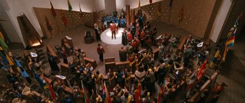 Movie still from “Star Trek VI: The Undiscovered Country” (1991), directed by Nicholas Meyer – An overhead view of a crowd of people gathered in a building; Extreme Wide shot, High angle