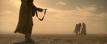 Movie still from “Star Trek V: The Final Frontier” (1989), directed by William Shatner – A person flying a kite in the middle of the ocean; Extreme Wide shot, Low angle