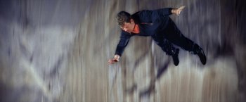 Movie still from “Star Trek V: The Final Frontier” (1989), directed by William Shatner – A man riding a skateboard down a ramp; Wide shot, Overhead angle
