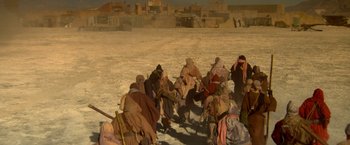 Movie still from “Star Trek V: The Final Frontier” (1989), directed by William Shatner – A group of people sitting in the snow; Extreme Wide shot, High angle