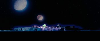 Movie still from “Star Trek V: The Final Frontier” (1989), directed by William Shatner – A full moon is seen in the night sky; Extreme Wide shot, Low angle