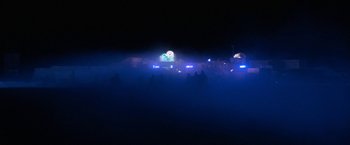 Movie still from “Star Trek V: The Final Frontier” (1989), directed by William Shatner – A view of a city lit up at night; Extreme Wide shot, High angle