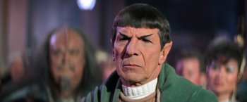 Movie still from “Star Trek V: The Final Frontier” (1989), directed by William Shatner – A wax figure of spock from star trek; Close Up shot, Over the shoulder angle