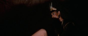 Movie still from “Star Trek V: The Final Frontier” (1989), directed by William Shatner – A person wearing a headpiece; Close Up shot, Overhead angle