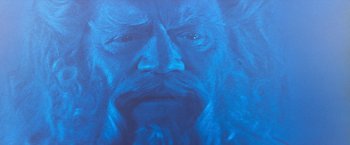 Movie still from “Star Trek V: The Final Frontier” (1989), directed by William Shatner – A painting of an old man with a long beard; Close Up shot, Overhead angle