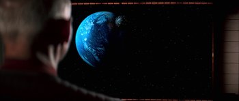 Movie still from “Star Trek: First Contact” (1996), directed by Jonathan Frakes – An image of an earth in the middle of the night; Extreme Close Up shot, Over the shoulder angle