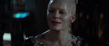 Movie still from “Star Trek: First Contact” (1996), directed by Jonathan Frakes – A person wearing a costume; Close Up shot, Over the shoulder angle