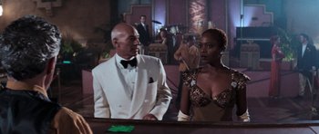 Movie still from “Star Trek: First Contact” (1996), directed by Jonathan Frakes – A man and a woman are standing in front of a mirror; Medium shot, Over the shoulder angle